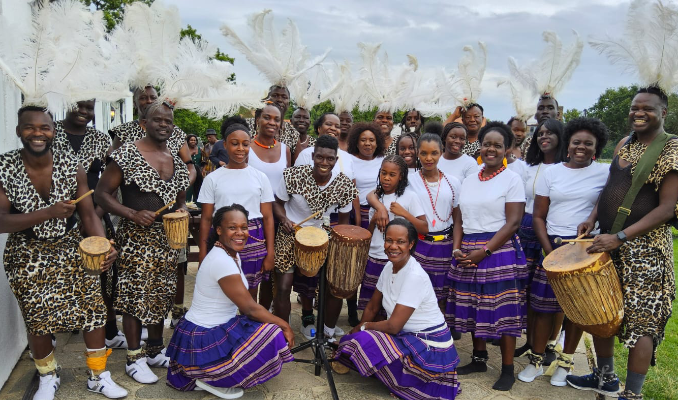 Members of the Lwo Cultural Group celebrating Acholi culture through traditional dance and performance